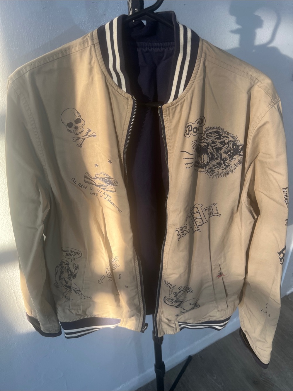 Polo by Ralph Lauren Tan Bomber Jacket with Black Trim and Graphic Prints